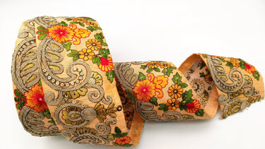 Peach Art Silk Fabric Trim With Orange, Green, Red And Gold Floral Embroidery